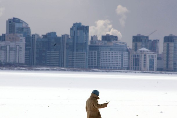 Ice fishing close to St Petersburg. Photograph: Patrik Rastenberger