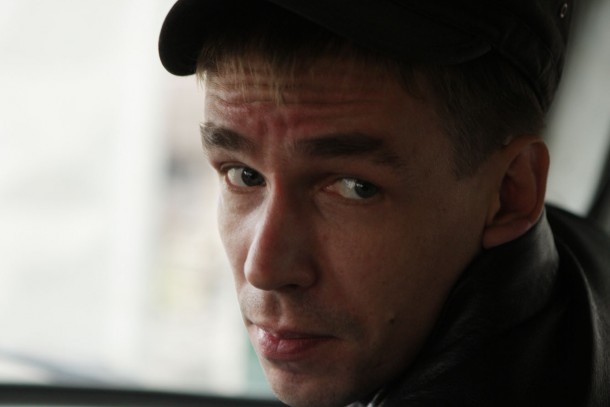 Maxim Pyazyiev from the local waste company Autospetstrans monitors dumping of waste
