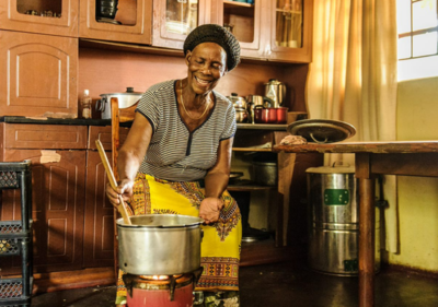 Modern Cooking Facility for Africa - Woman in Zambia using a clean cookstove