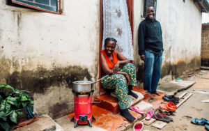 Photo: A woman using a Supamoto cookstove in Zambia – Emerging Cooking Solutions Zambia