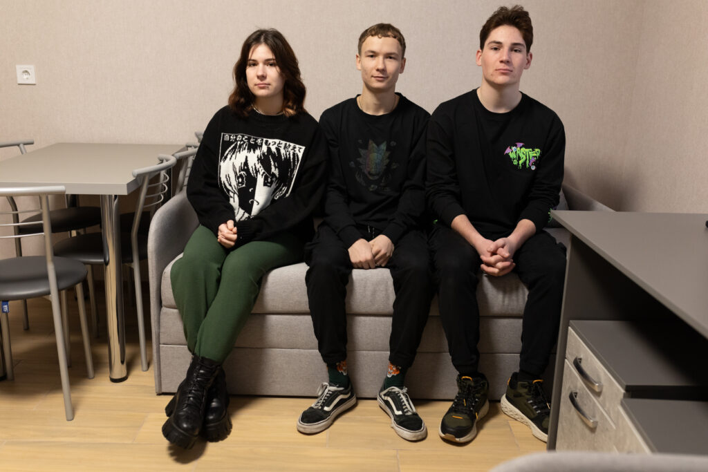 Illia with his brother and sister in the new apartment in Trostyanets for Nefco