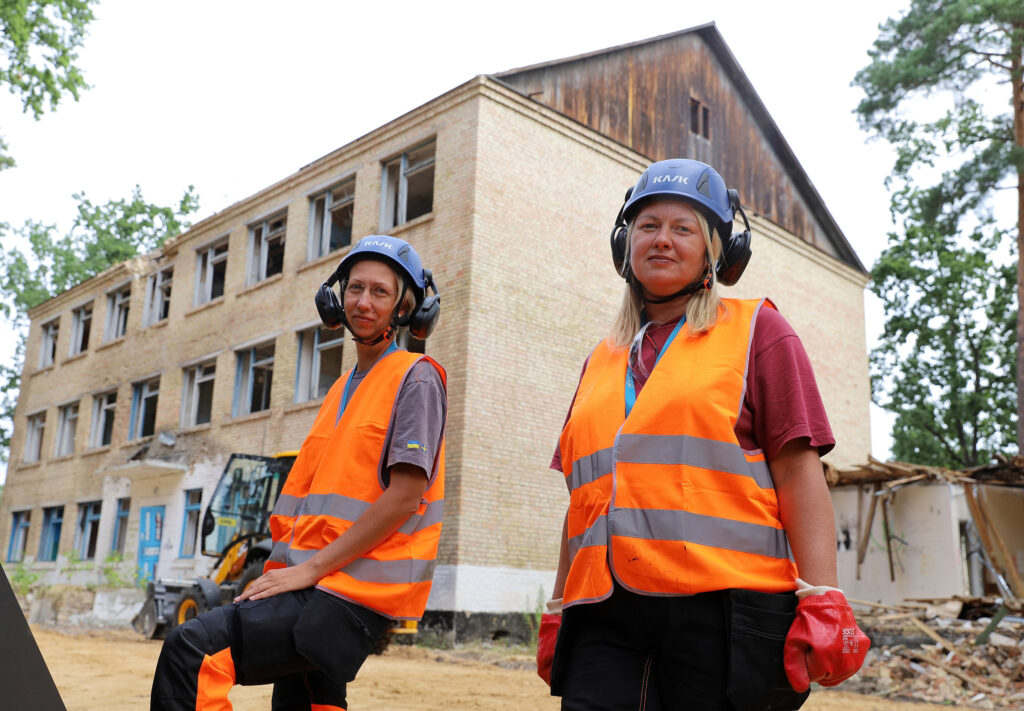 Trained femal demolition workers in Irpin