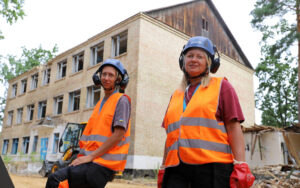 Trained femal demolition workers in Irpin