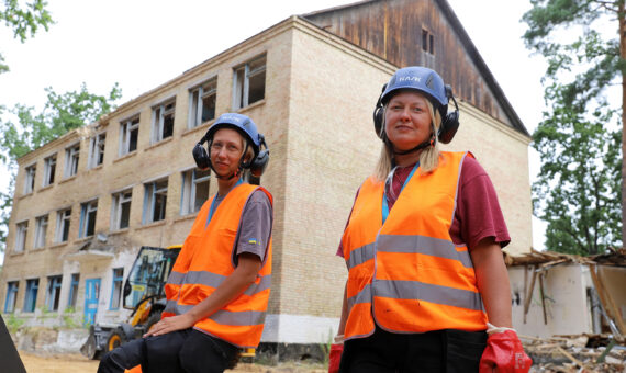 Trained femal demolition workers in Irpin